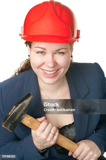 Young Beautiful Woman With Hammer And In Red Hard Hat Stock Photo - Download Image Now