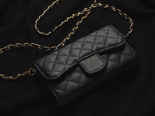 istock Black leather bag with golden chain 1191883080