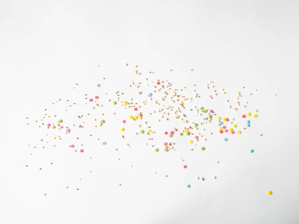 istock Colored sugar sprinkles background, Sugar sprinkle dots, decoration for cake and bakery, lot sprinkles background 1191883192