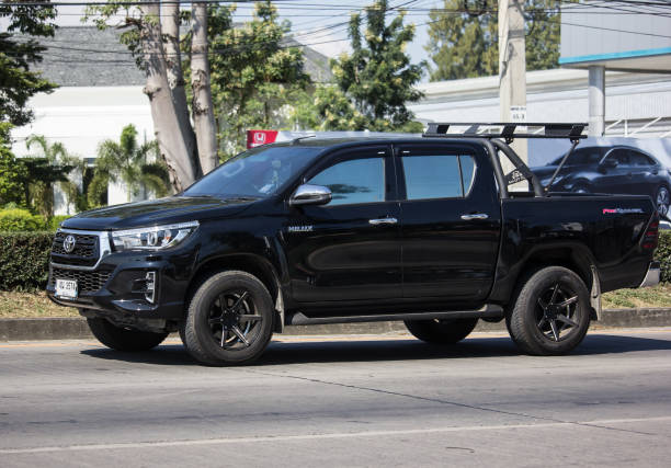 Private Pickup Truck Car Toyota Hilux Revo Chiangmai, Thailand - November 21 2019: Private Pickup Truck Car Toyota Hilux Revo. On road no.1001, 8 km from Chiangmai city. toyota hilux stock pictures, royalty-free photos & images