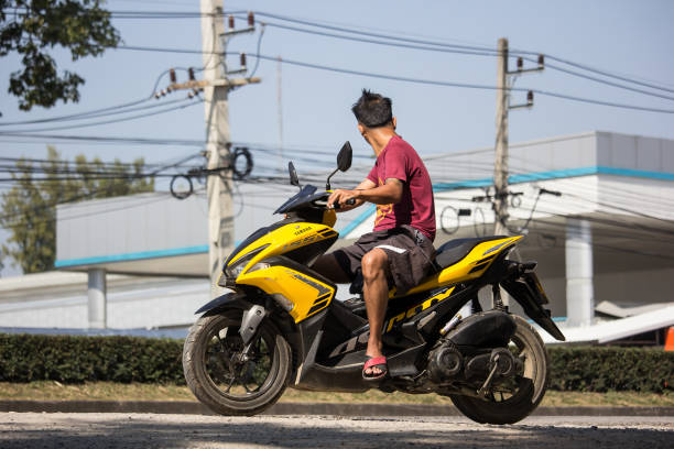 Chiangmai, Thailand - November 25 2019: Private Motorcycle, YAMAHA Aerox 155. Photo at road no.121 about 8 km from downtown Chiangmai, thailand.