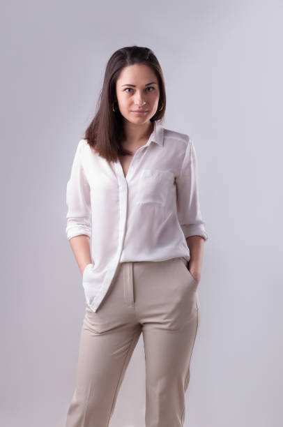 istock Young business girl is looking at camera 1191885693