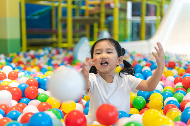 istock Cute girl at the Ball Pool 1191887214