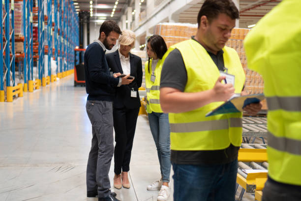 istock Managers in Warehouse discuss about business 1191888497