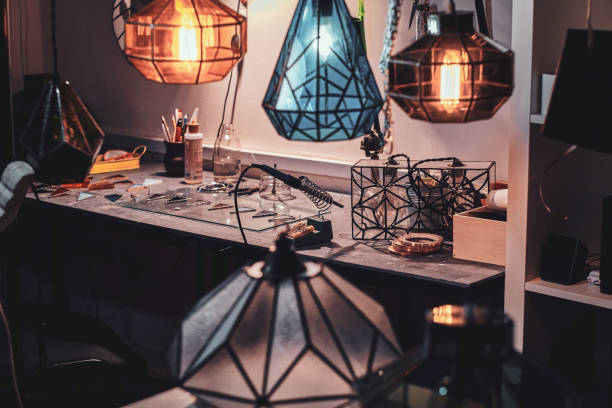 istock Different colourfu lamps at busy glass workshop 1191889897
