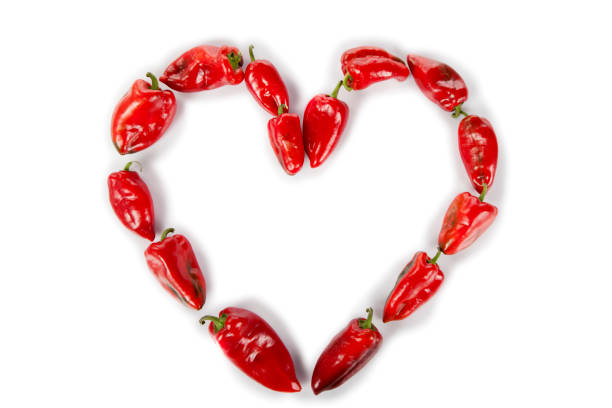 istock Red peppers in heart shape 1191890338