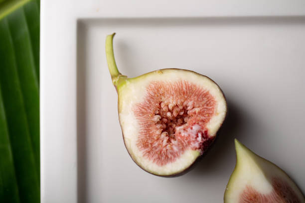 Fresh ripe figs closeup on a dark background