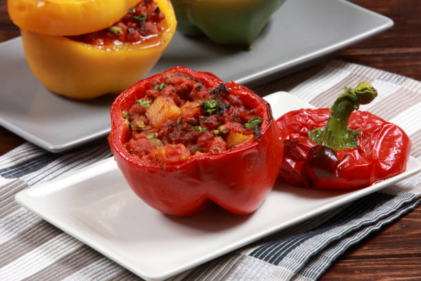istock Stuffed Bell Peppers with meat and vegetables added making a savory dish 1191891581