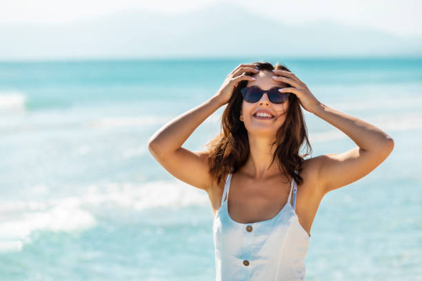 istock young brunette on vacation on Majorca on a beach 1191893889