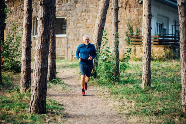 Older man jogging in the morning