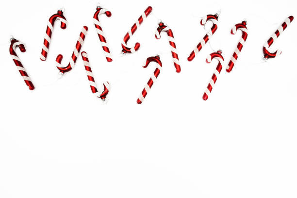 istock Christmas composition. Border made of red decorations on white background. 1191895876