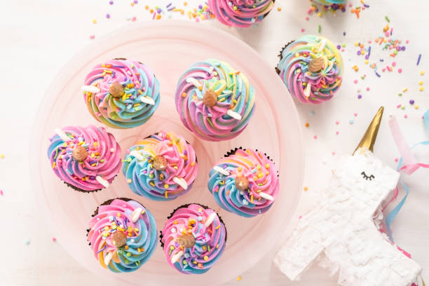 istock Unicorn cupcakes decorated with colorful buttercream icing 1191897154