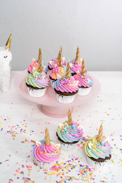 istock Unicorn cupcakes decorated with colorful buttercream icing 1191897459
