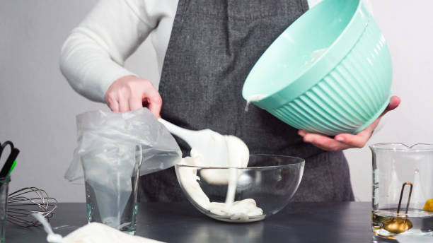 istock Mixing in food coloring into the royal icing 1191898582