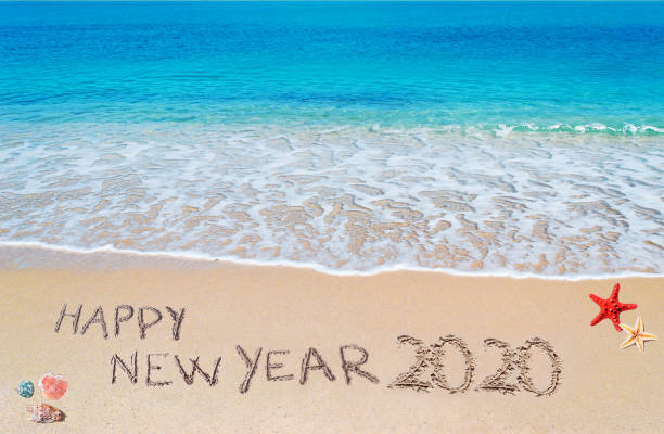 istock happy new year 2020 on the beach 1191901065