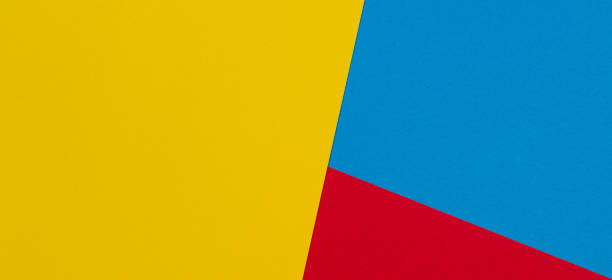 istock Abstract yellow, red and light blue color paper geometry composition background 1191901599