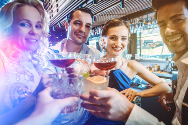 istock Four friends in a bar 1191902758