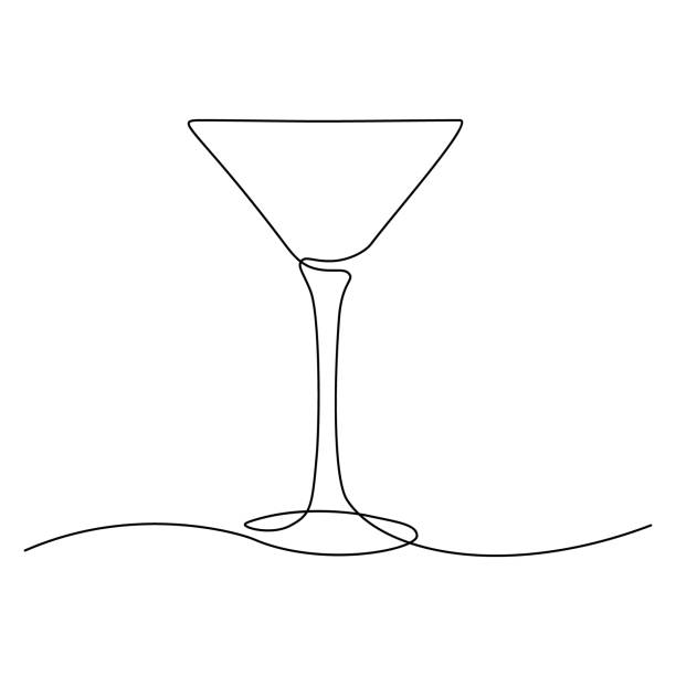 Cocktail glass Cocktail glass in continuous line art drawing style. Minimalist black line sketch on white background. Vector illustration martini stock illustrations
