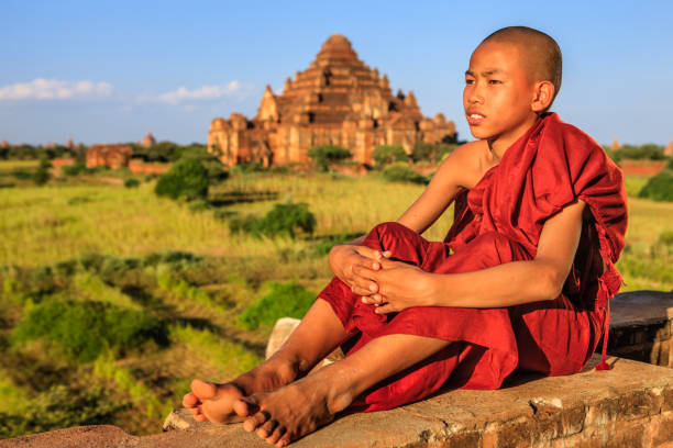 istock Young Buddhist monk looking at the view, Bagan, Myanmar 1191914795