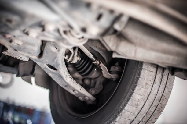 istock Motor vehicle on lift in auto vulcanizing and service workshop 1191915436