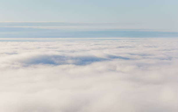 istock Aerial view of cloudscape against blue sky 1191921094