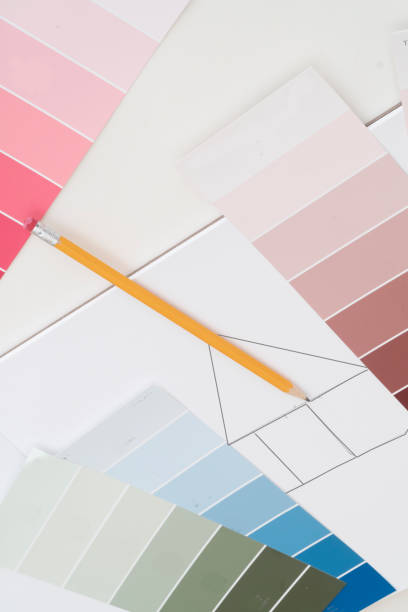 istock Items on an architects table are used to design a dream home. 1191922158