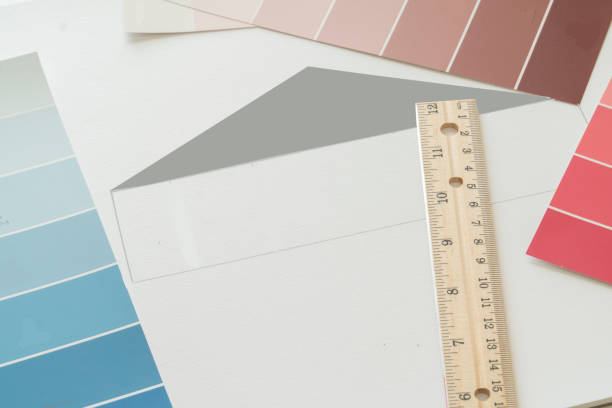 istock Items on an architects table are used to design a dream home. 1191922166