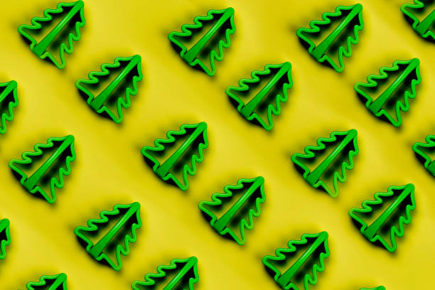 istock Christmas pattern with Christmas tree cookie cutter. Minimal holiday concept. 1191923489