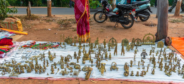 Dhokra Shantiniketan,West Bengal, India, November 30,2019: Dhokra  (also spelt Dokra) Work products displayed in the mela for sale at Shantiniketan,India. metal molding stock pictures, royalty-free photos & images