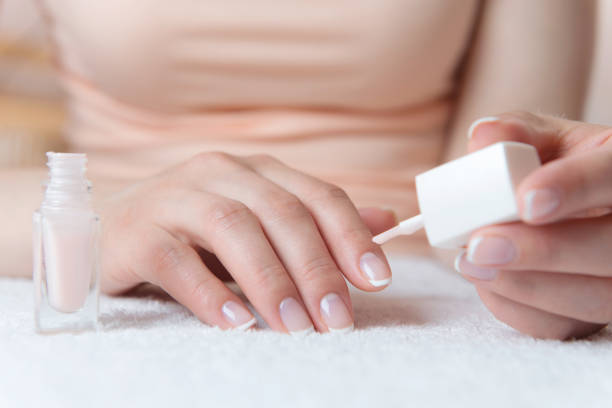 istock Womans hands with beautiful french manicure 1191926331