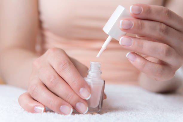 istock Womans hands with beautiful french manicure 1191926338