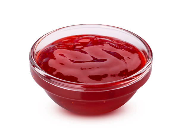 istock Red berry jam isolated on white background 1191928353
