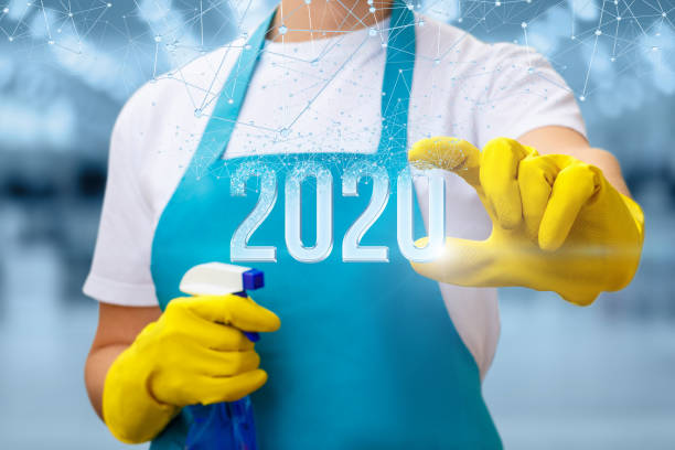 istock The cleaning lady shows the new 2020 year . 1191928521