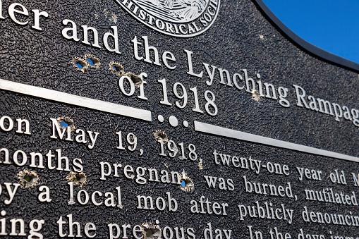 Hahira, Georgia - November 30, 2019: A bullet-riddled sign marks the spot where 21-year-old Mary Turner was brutally murdered in 1918 by a local mob after publicly denouncing her husband's lynching.