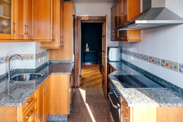 istock Kitchen on two fronts with wooden furniture 1191934175