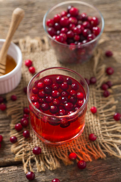 istock cranberry drink on wooden surface 1191936812