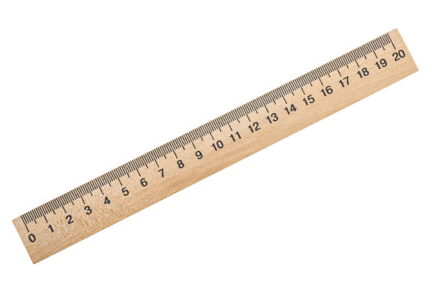 istock Wooden ruler isolated on a white background, top view. 1191936850