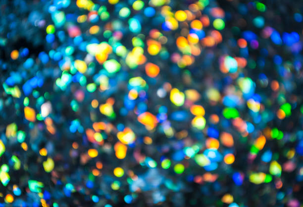 istock Christmas background. Festive glowing color overflows. Defocused chaotic circles Blurred bokeh. 1191937110