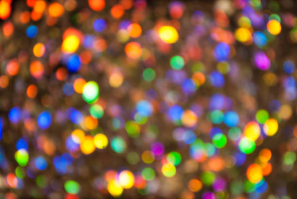 istock Christmas background. Festive glowing color overflows. Defocused chaotic circles Blurred bokeh. 1191937111