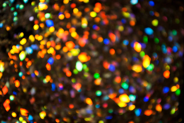 istock Christmas background. Festive glowing color overflows. Defocused chaotic circles Blurred bokeh. 1191937128