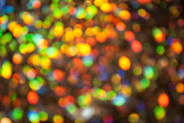istock Christmas background. Festive glowing color overflows. Defocused chaotic circles Blurred bokeh. 1191937129