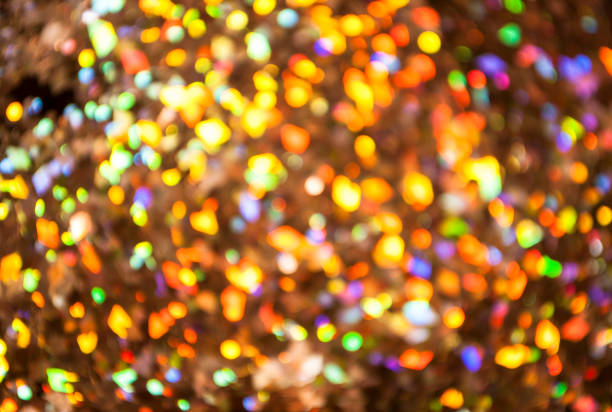 istock Christmas background. Festive glowing color overflows. Defocused chaotic circles Blurred bokeh. 1191937130