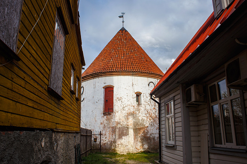 The Red Tower of the XV century in Parnu, Estonia. Part of the old defensive city wall. The tower served as a prison (had a 6-meter underground floor). Since the XIX century was used as an archive.