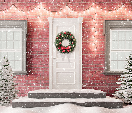 White front door with Christmas wreath and festive decorations on holidays at snowy night 3d render