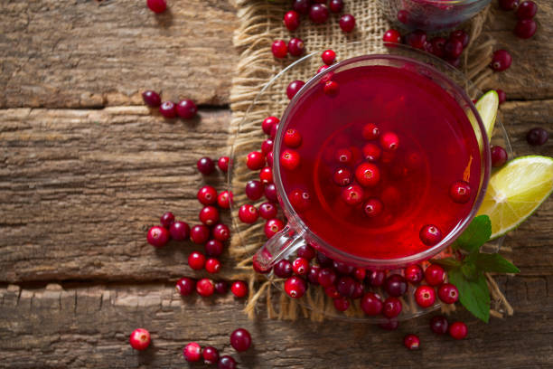istock cranberry tea on wooden surface 1191938940