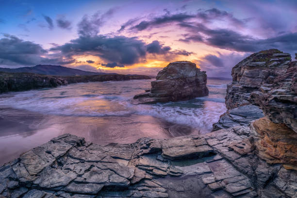 istock Picturesque rocks and cliffs on Praia das Illas, Spain 1191947669