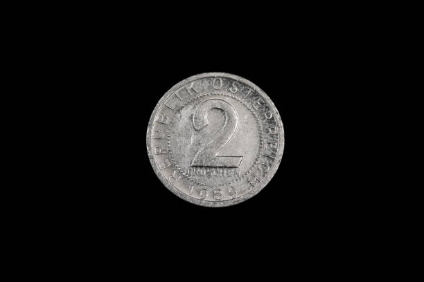istock An old Austrian silver coin isolated on a black background 1191947795