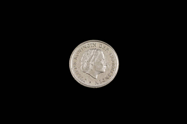 istock An old Dutch coin isolated on a black background 1191947872