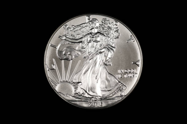 istock An American silver eagle coin isolated on a black background 1191948532