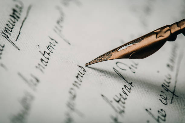 istock fountain pen on paper with ink text closeup 1191951843